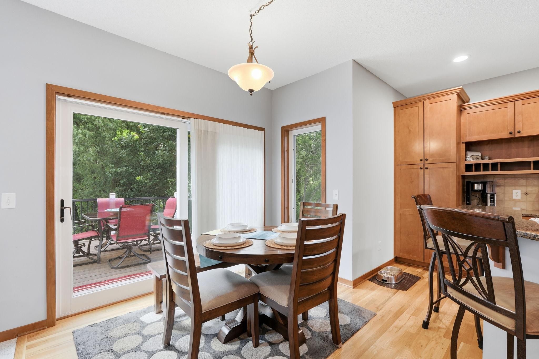 Informal eat-in kitchen gives plenty of space for entertaining and leads to the newer deck.