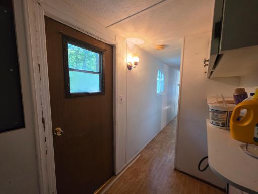 Back door, laundry area and between bedrooms