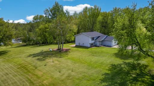 Incredible opportunity to enjoy the connected Chisago Lakes chain with year-round recreation right from your own property.
