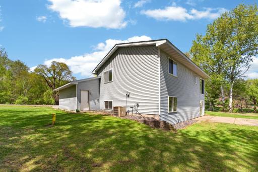 Spacious lot offers privacy, room to roam, and a peaceful up-north feel while still being close to town amenities.