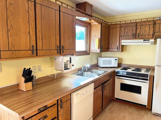 A closer look at the kitchen appliances and cabinetry.