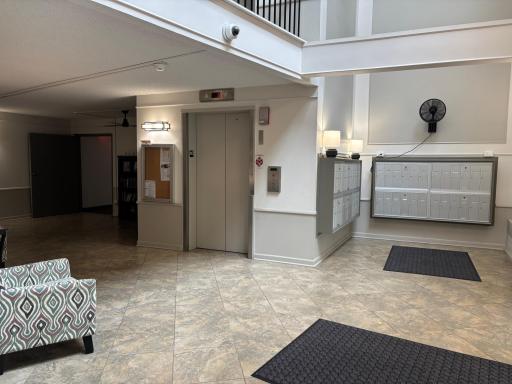 Inviting entry, mailboxes and elevator