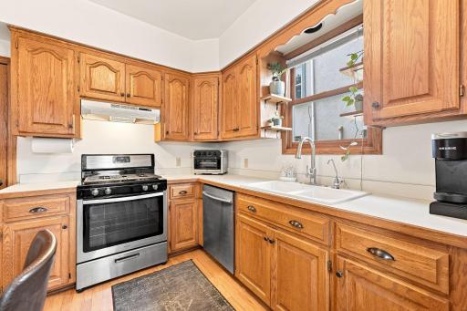 Updated kitchen with functional cabinetry and natural light