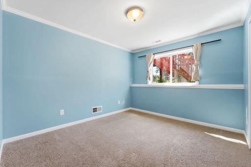 Nice LL 4th bedroom overlooks the backyard.