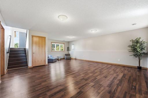 Huge family room makes it easy to host lively gatherings or enjoy quiet evenings at home.