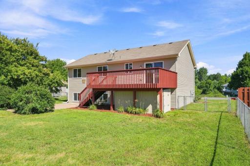 Oversized deck with convenient stairs down to the yard. Storage shed is tucked neatly away under the deck.