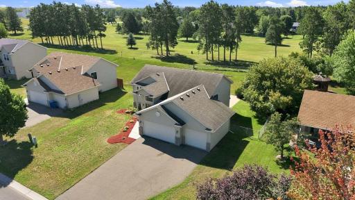 This well-maintained property is nestled in a peaceful neighborhood with a beautiful open backdrop.