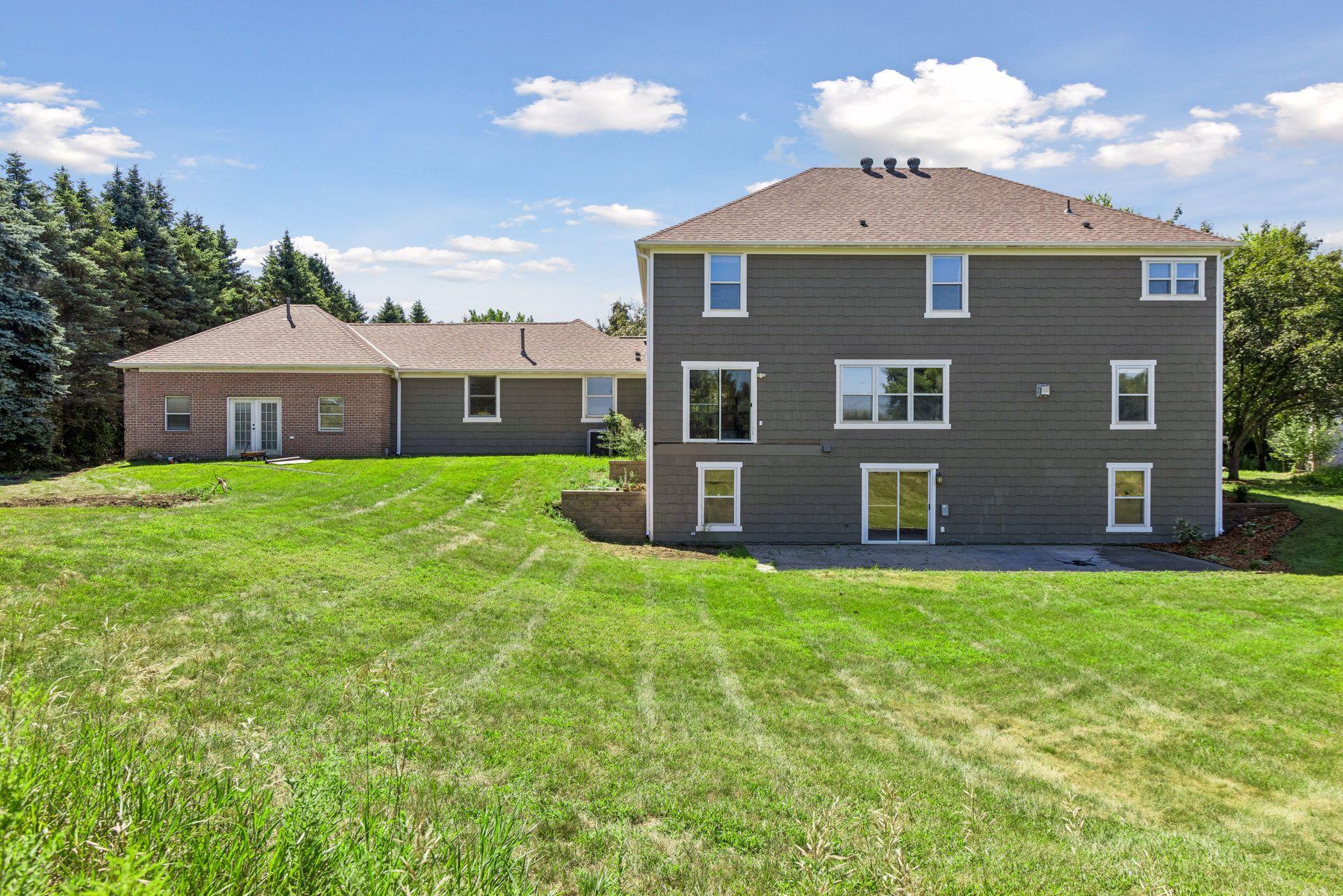 Expansive backyard green space with nearly 7 acres to enjoy—plenty of room to roam, play, entertain and bring your outdoor ideas to life.
