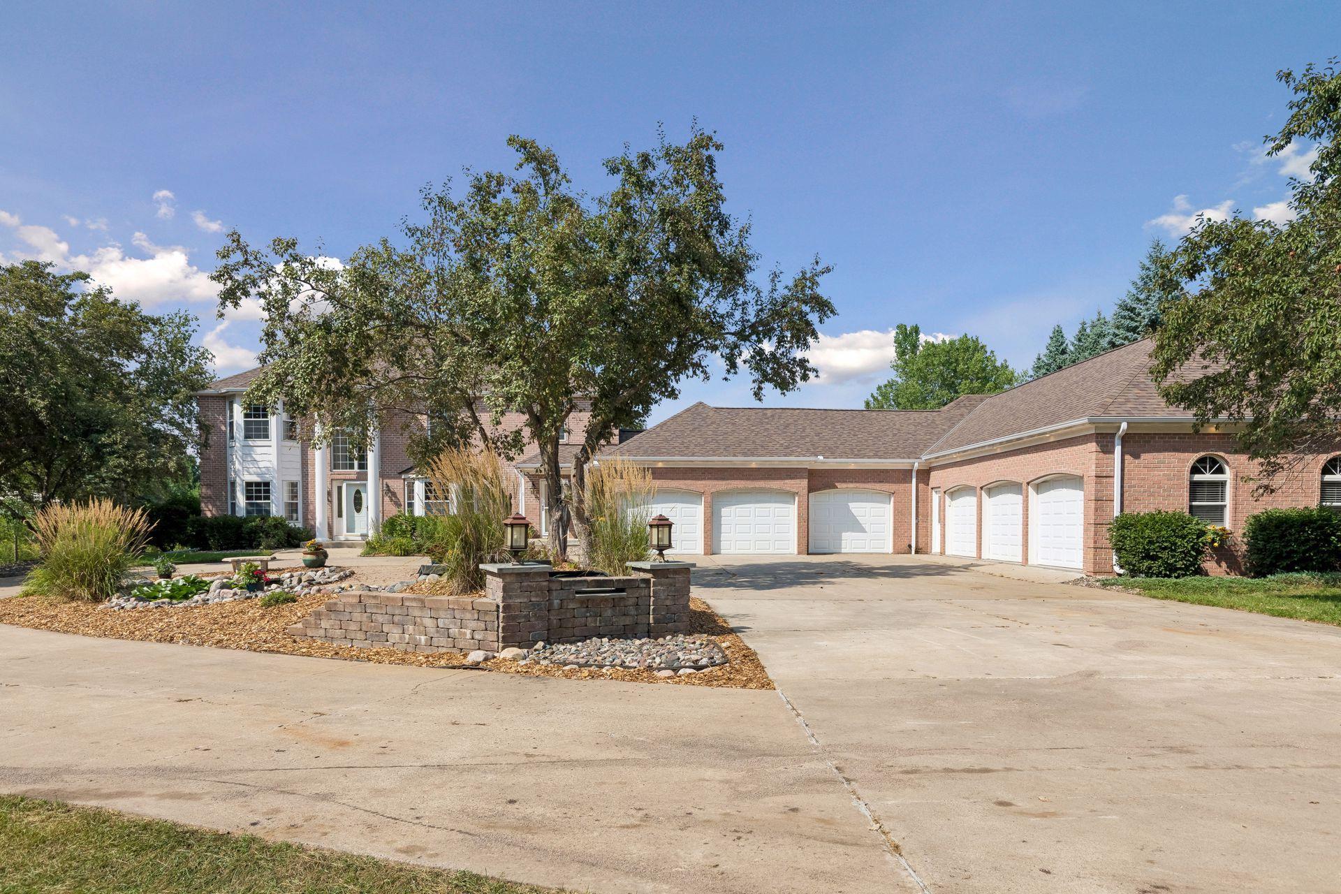 Another look at this impressive home and its fantastic circular driveway—beautiful, functional and perfect for welcoming guests.