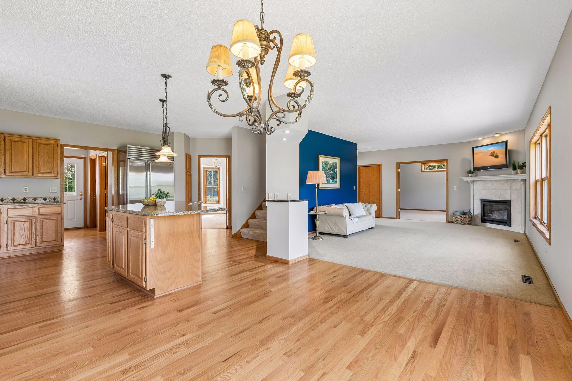 Love this layout! From the kitchen, enjoy open sightlines into the family and dining rooms, plus a unique split staircase with one side leading conveniently into the kitchen.