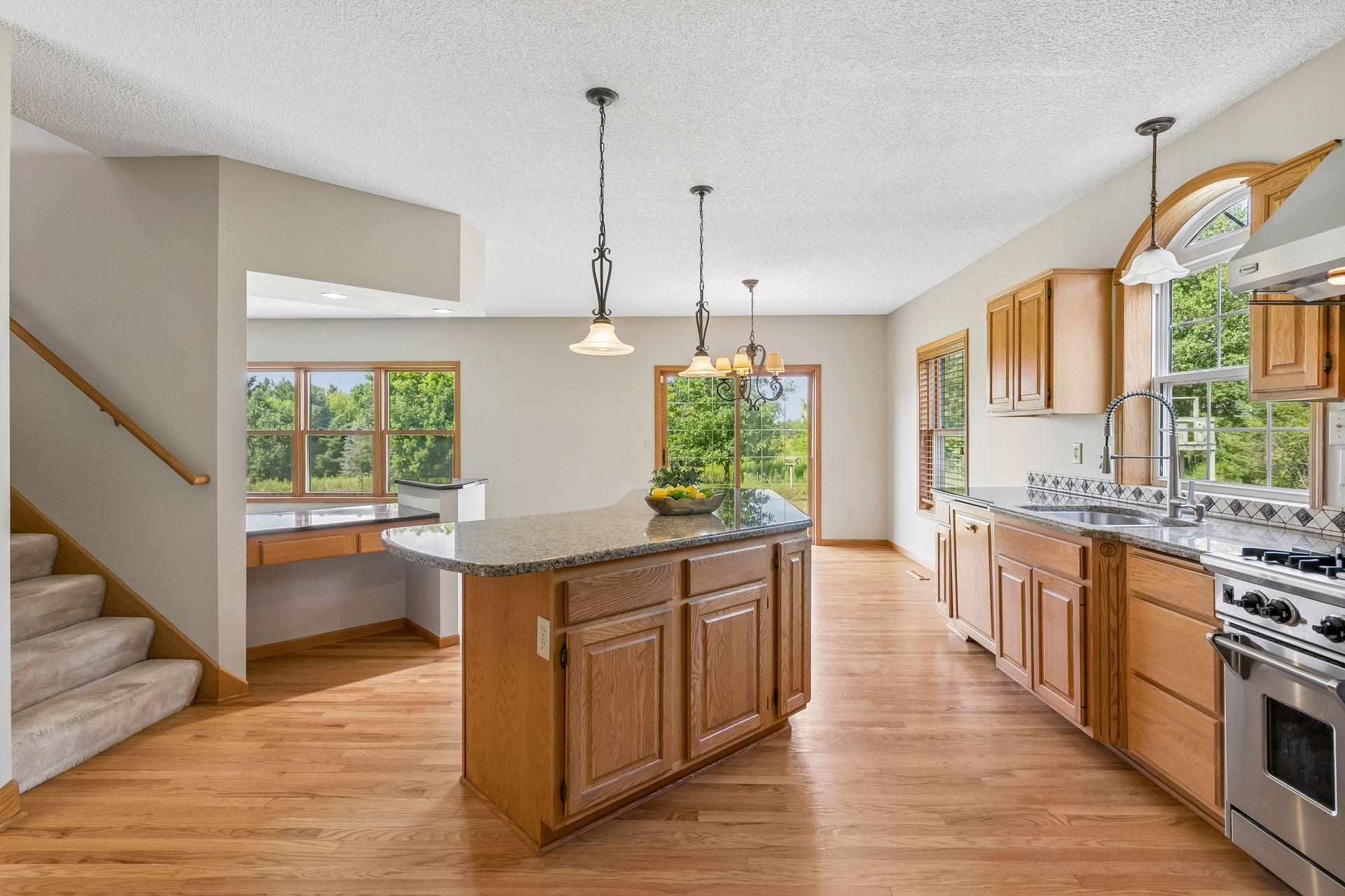 One more look at this incredible kitchen—generous cabinetry, abundant workspace and plenty of room for everyone to gather.