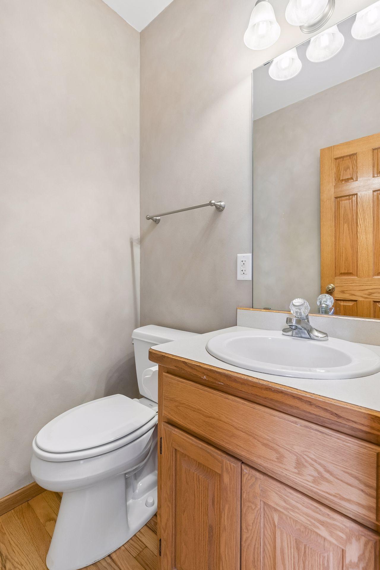 Convenient main-floor powder room tucked just off the primary living spaces.