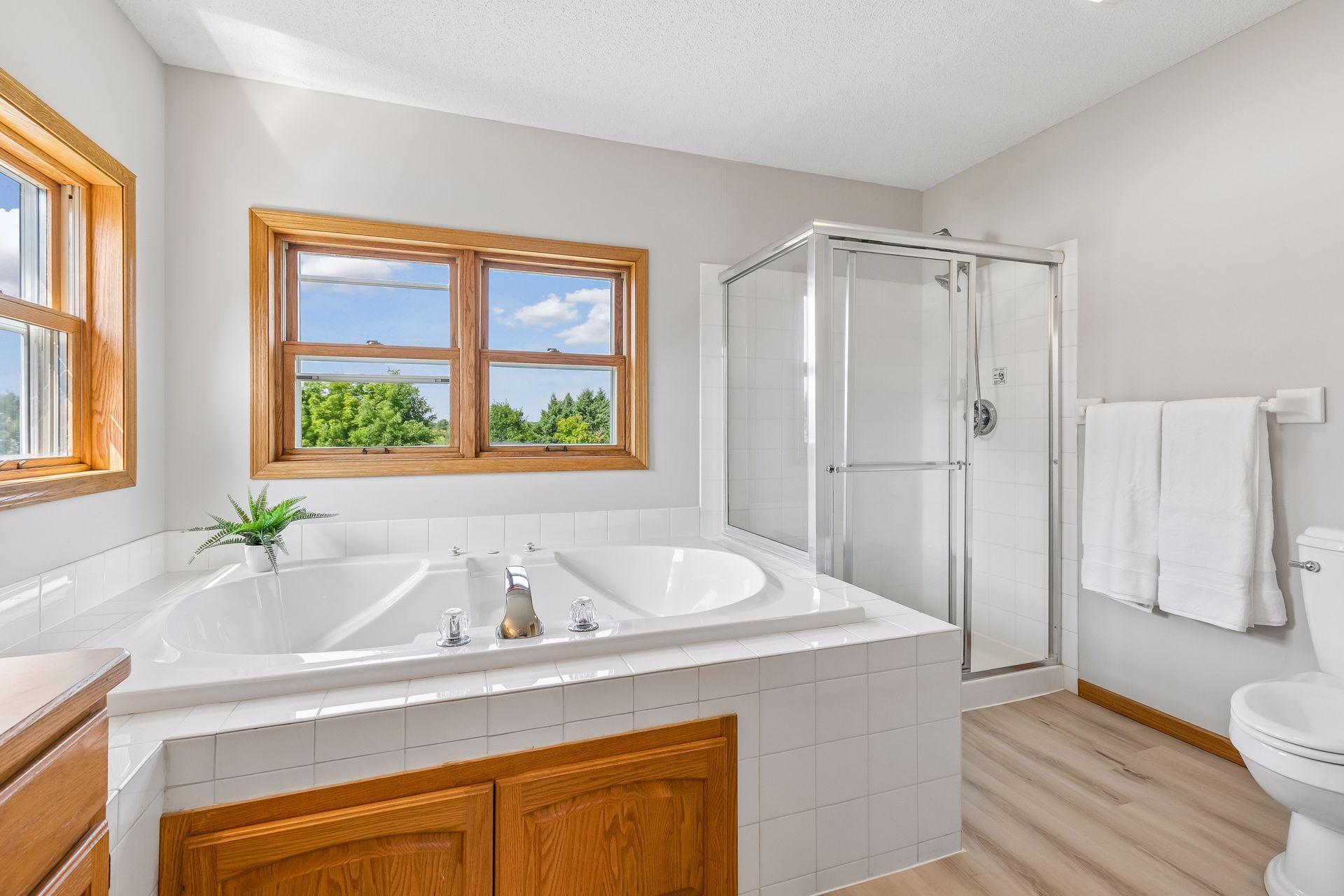 Time to unwind! The oversized jetted tub creates a tranquil retreat right within the primary suite.