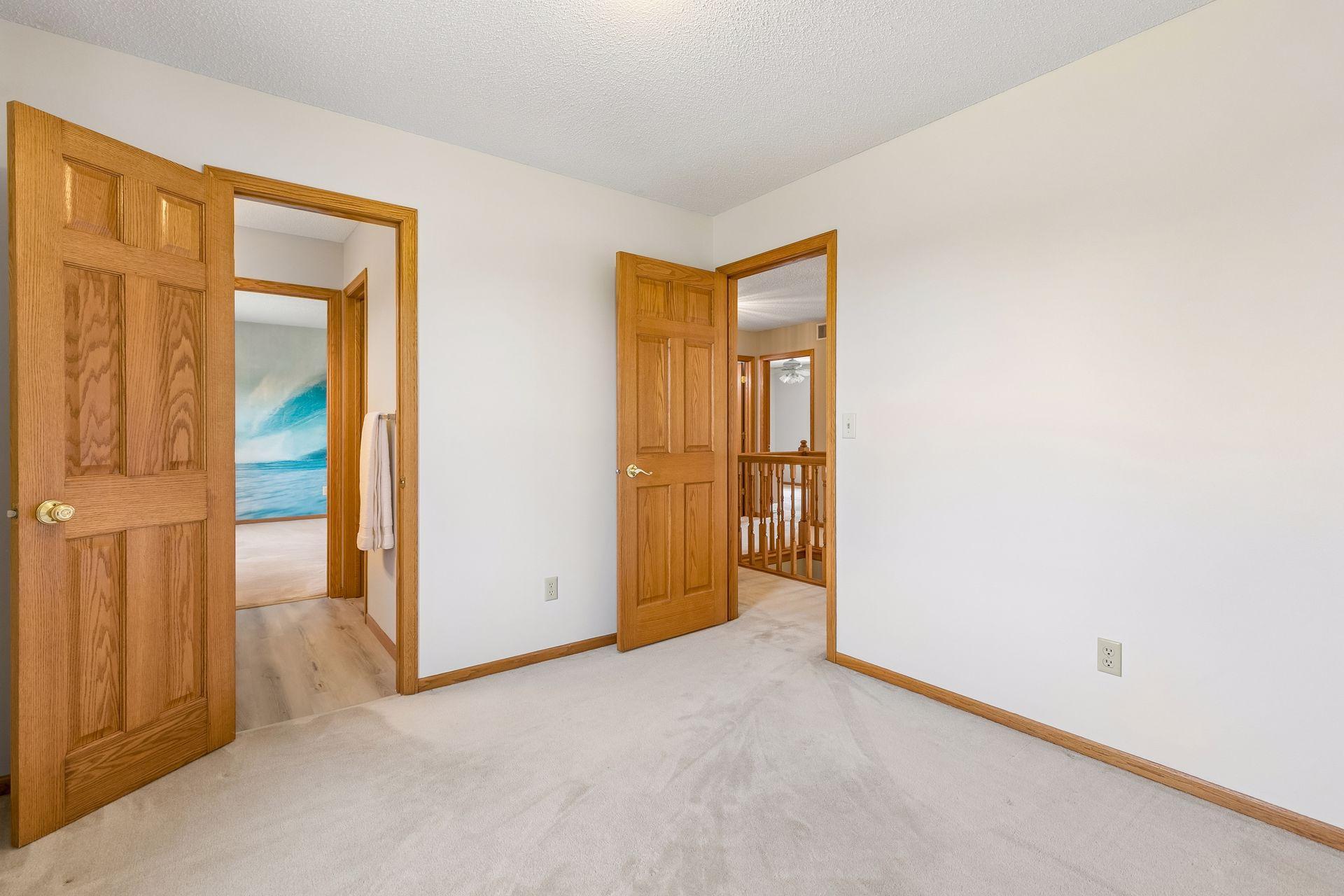 Another look at bedroom two, which connects directly to the neighboring bedroom through the shared Jack-and-Jill bathroom.