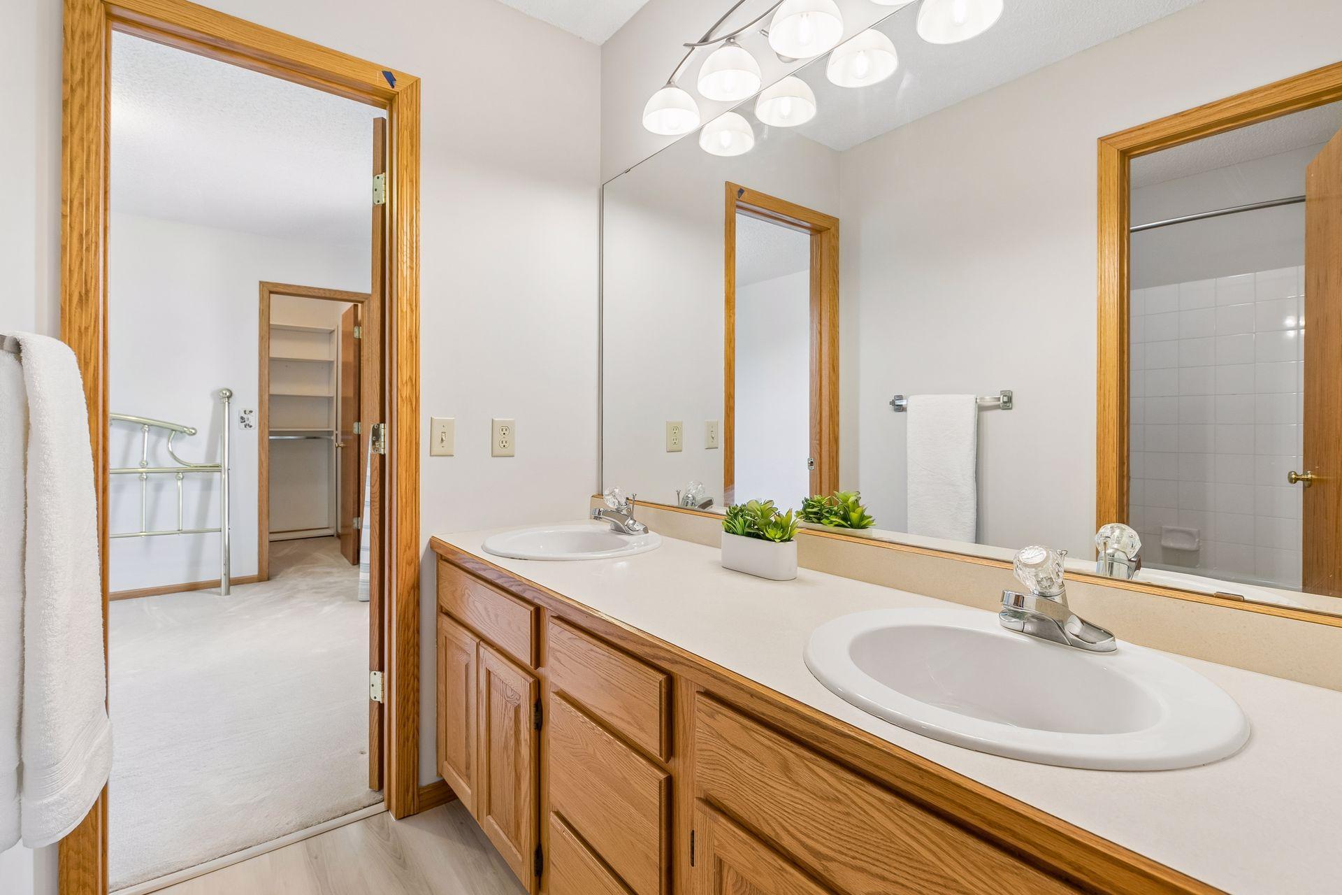 The Jack-and-Jill bathroom conveniently connects bedrooms two and three, creating a functional setup for family or guests.