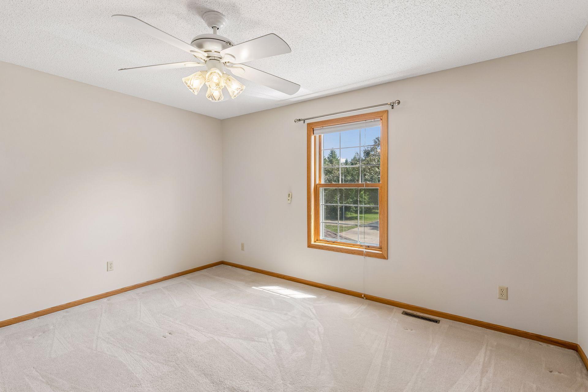 Upper-level bedroom four offers another spacious and comfortable retreat with its own convenient bathroom access.