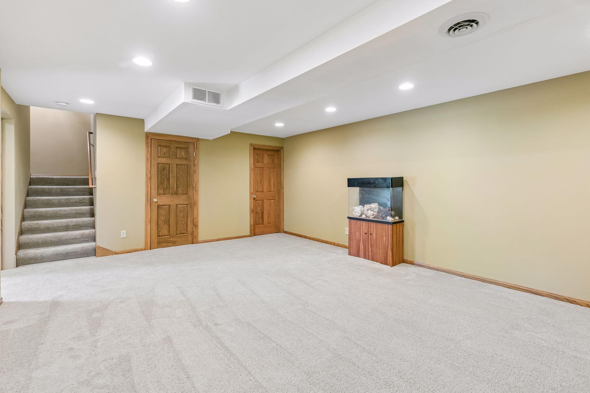 Welcome to the lower level! This flexible space was designed with a future home theater in mind—just add your finishing touches.