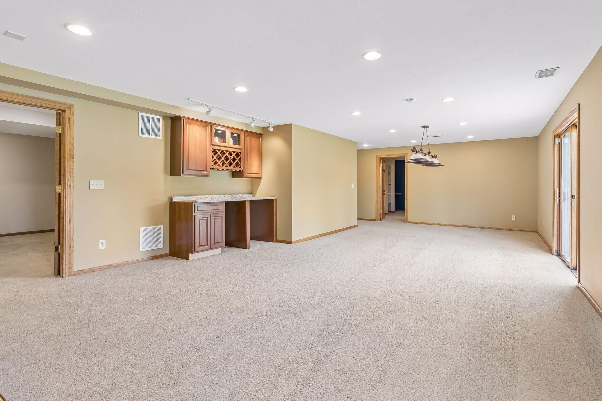 A dedicated bar area makes the lower level even more fun for entertaining family and friends.