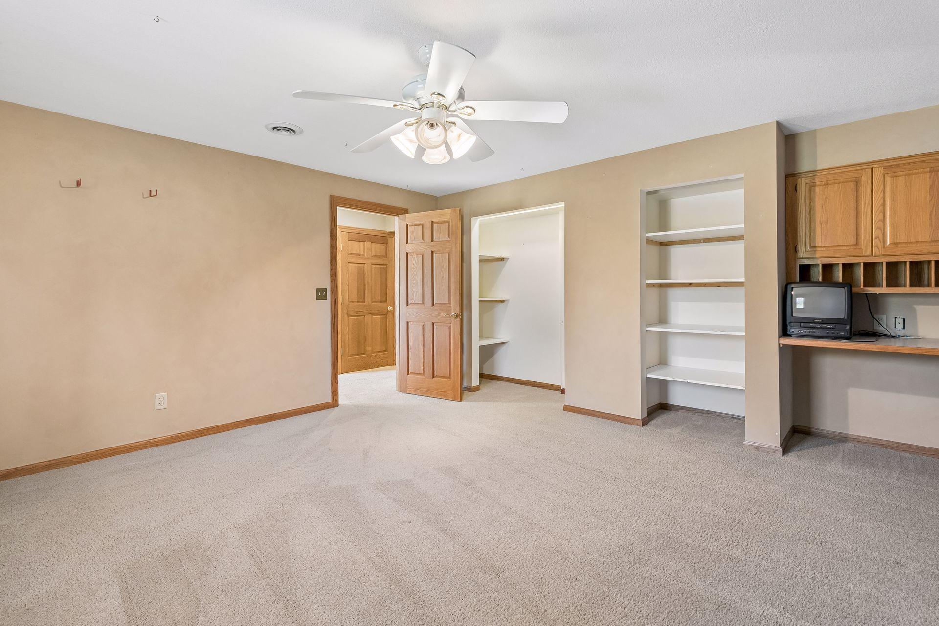 Another view of the spacious fifth bedroom. The lower level also includes a rough-in for a future bathroom, adding even more potential.