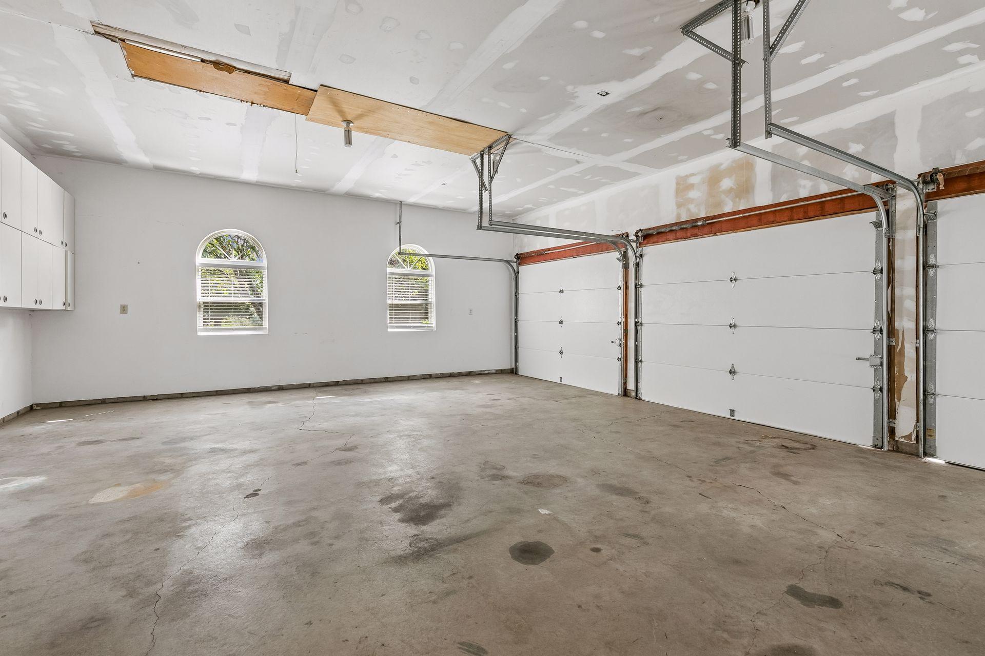 A workshop connects the two garage spaces, leading to an additional attached, insulated 3-car garage. Six attached garage stalls plus a dedicated workshop!