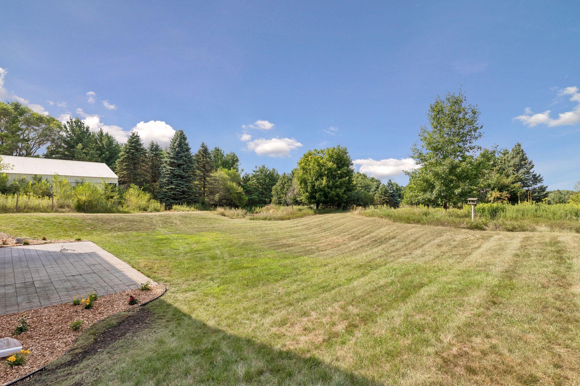 So much lawn to enjoy! The expansive backyard offers plenty of room for games, gatherings, pets and all kinds of outdoor fun.
