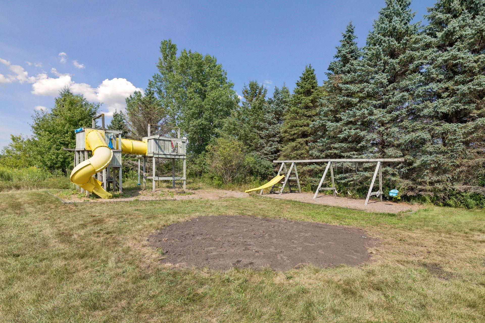 A dedicated playground area is ready for your ideas! The former in-ground trampoline has been removed, leaving a great space to reimagine for outdoor play.