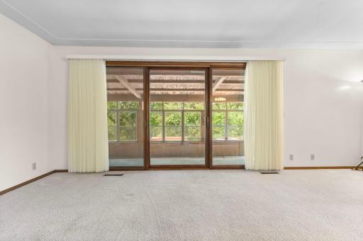 Enormous sliding glass door to porch