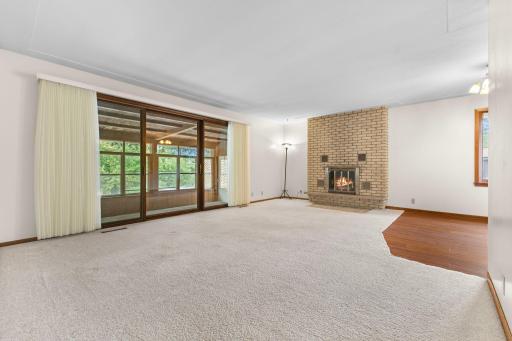 Living room with huge patio door to porch