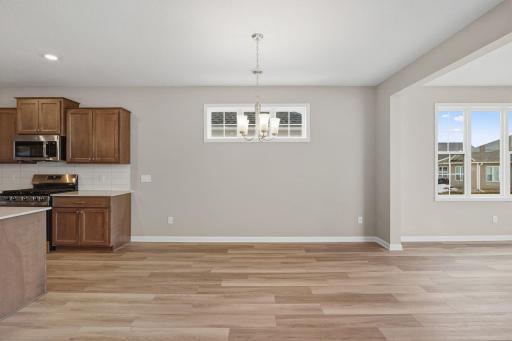Informal dining room with transom windows