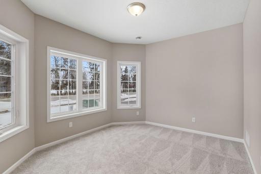 Front flex room/den with bay window