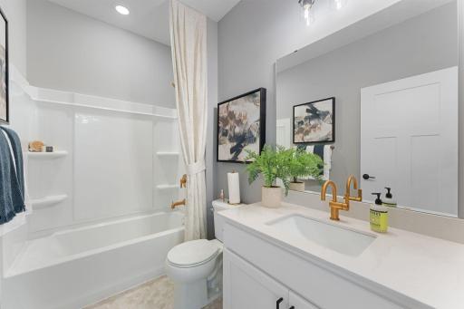 Main full bath - staged model - showing for representational purposes of floorplan only, Finishes/options will be different.