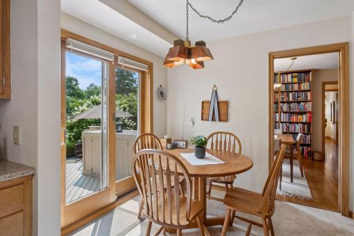 Sliding door to deck and brick patio for seamless indoor-outdoor living!