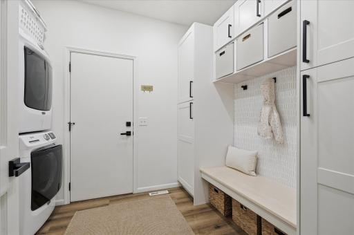 The bench and baskets make this mud room so functional and the cabinets are the same Klearvue cabinets you saw in that stunning kitchen.