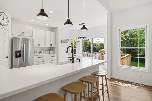 The kitchen leads to the 14x12 deck you saw in the back yard pictures, making summertime grillin' & chillin' a literal & figurative breeze.
