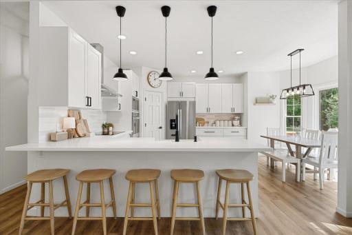 This huge peninsula easily fits 5 stools. Belly up for breakfast with us - I'll have the eggs benedict!