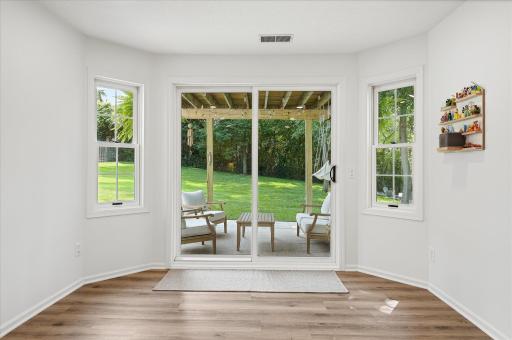The area right next to the walkout door features luxury vinyl plank flooring so you don't have to worry about tracking in on the carpet.