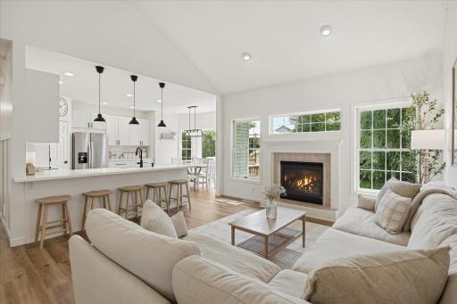 The bright, open concept floorplan is so so great for entertaining. The vaulted ceilings, all the lights and the huge windows are simply mood enhancers.