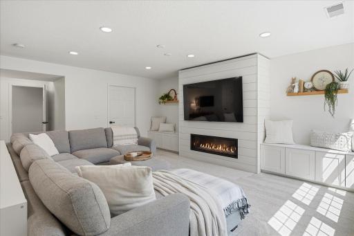 On the left and rear of this photo, you can see that the "basement door" is closeable, separating the two levels from one another for movie nights with loud surround sound, or so that your guests can have some privacy & separation.