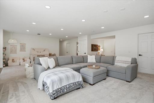 That sectional sofa is enormous, and it fits in this space easily.