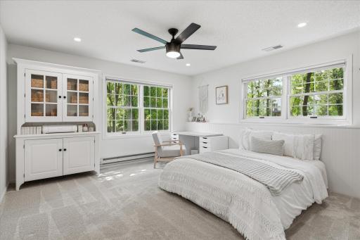 Bedroom #5 is enormous and includes recessed lighting, a ceiling fan, a beadboard wainscoting wall, a supplemental baseboard heater and stringless, room darkening honeycomb shades.
