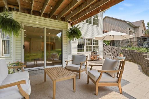 This patio area is HUGE, and there is even a safety fence along the top side of the retaining wall.