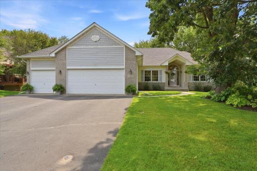 The low-maintenance exterior features architectural shingles new in 2019, brick, LP Smartside and vinyl siding, steel garage doors and an in-ground irrigation system.