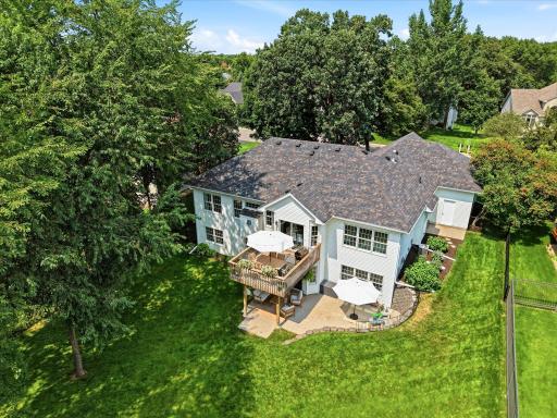 The large & private back yard features a refreshed deck, an enormous patio with a concrete hot tub pad, and it's fully fenced too!