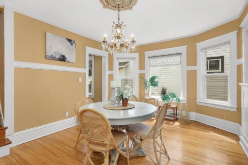 Dining room with south-facing bay window is large enough for a crowd