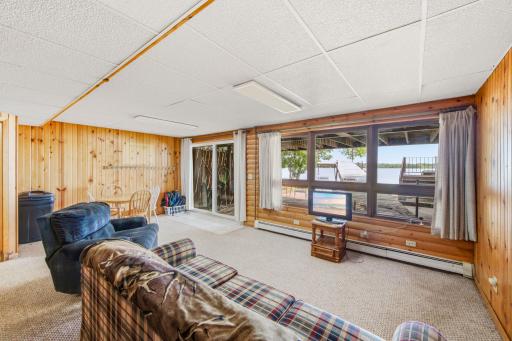 Lower level walk out and windows looking out towards the lake.