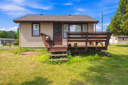 Lake facing second cabin with a deck