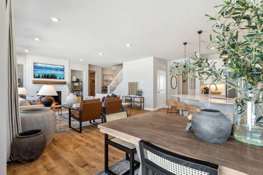 Gorgeous open floor plan, great for hosting. Photo of a model home, color & options will vary.