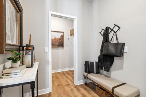 Expansive mudroom for an expansive house. Photo of a model home, color & options will vary.