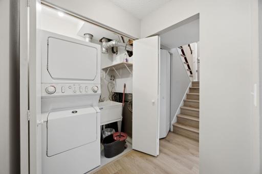 In-unit washer/dryer set is conveniently located near the bedrooms.