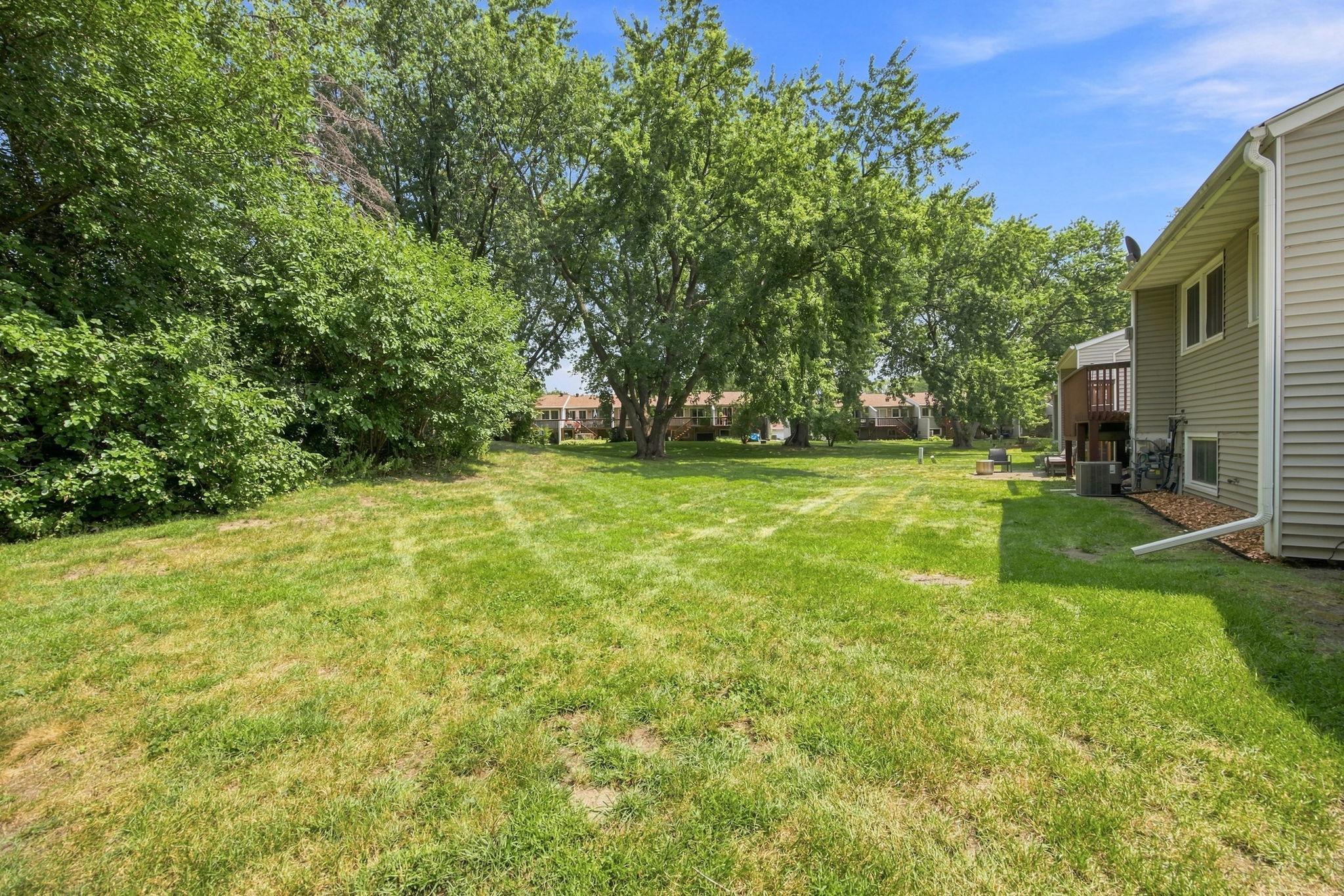 Enjoy the peaceful view of the backyard and birds playing in the trees.